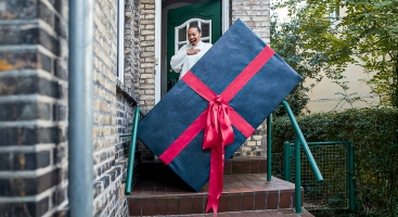 high expectations, behaviour, woman receiving huge parcel