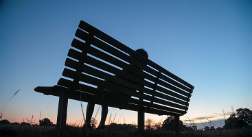 Wellbeing absence child sitting on bench