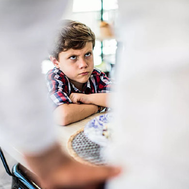 A student being told-off by their teacher